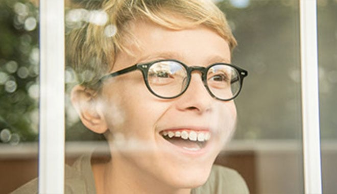 Student breathing fresh air in classroom